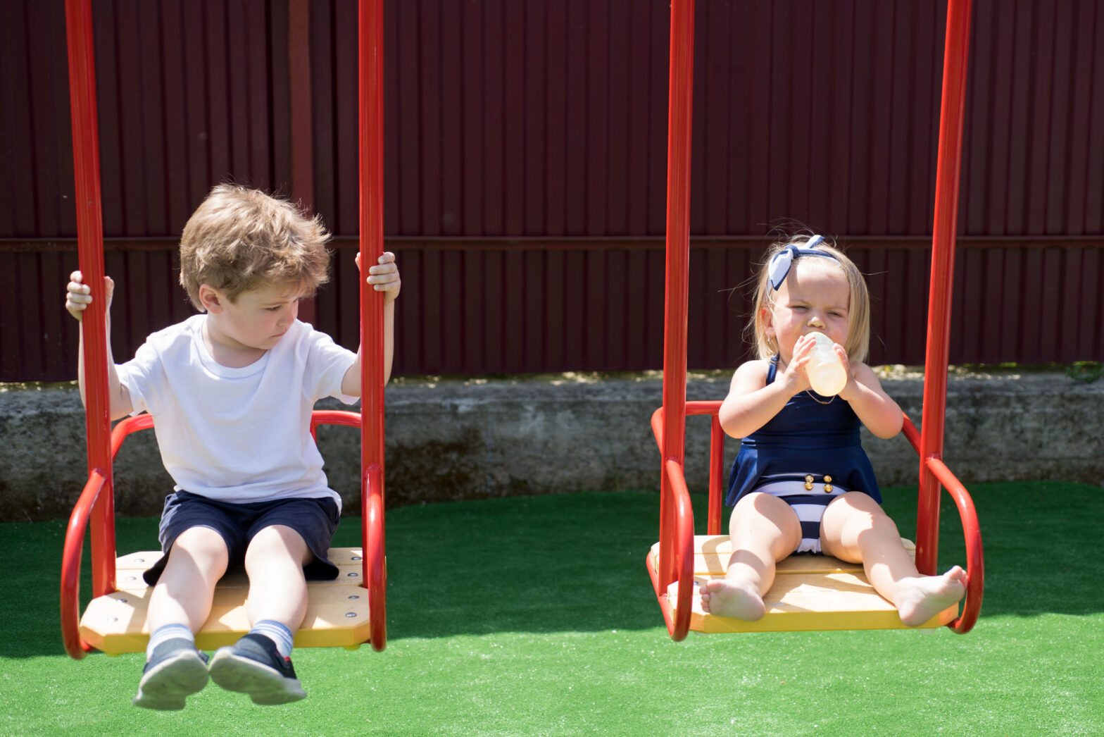 children on swings
