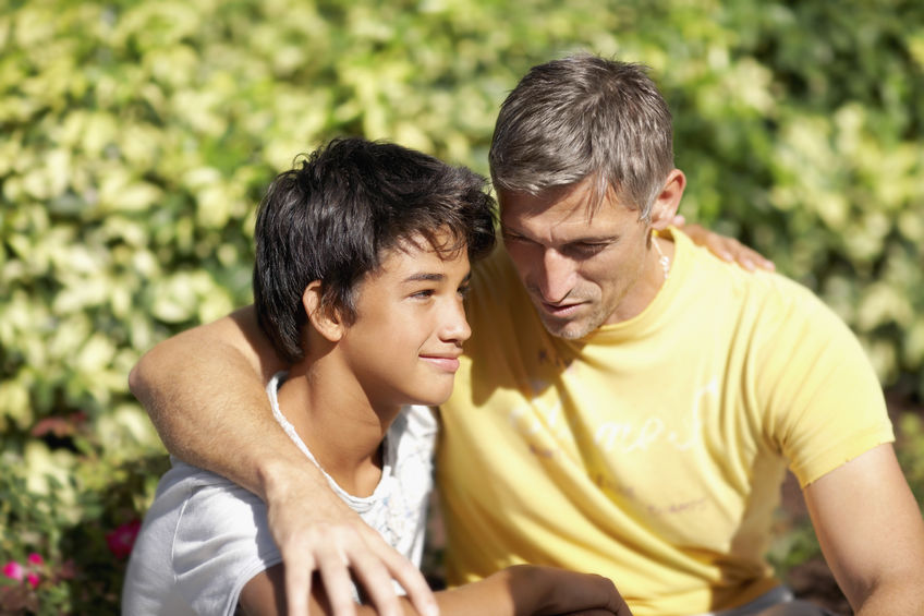 Father and son hugging