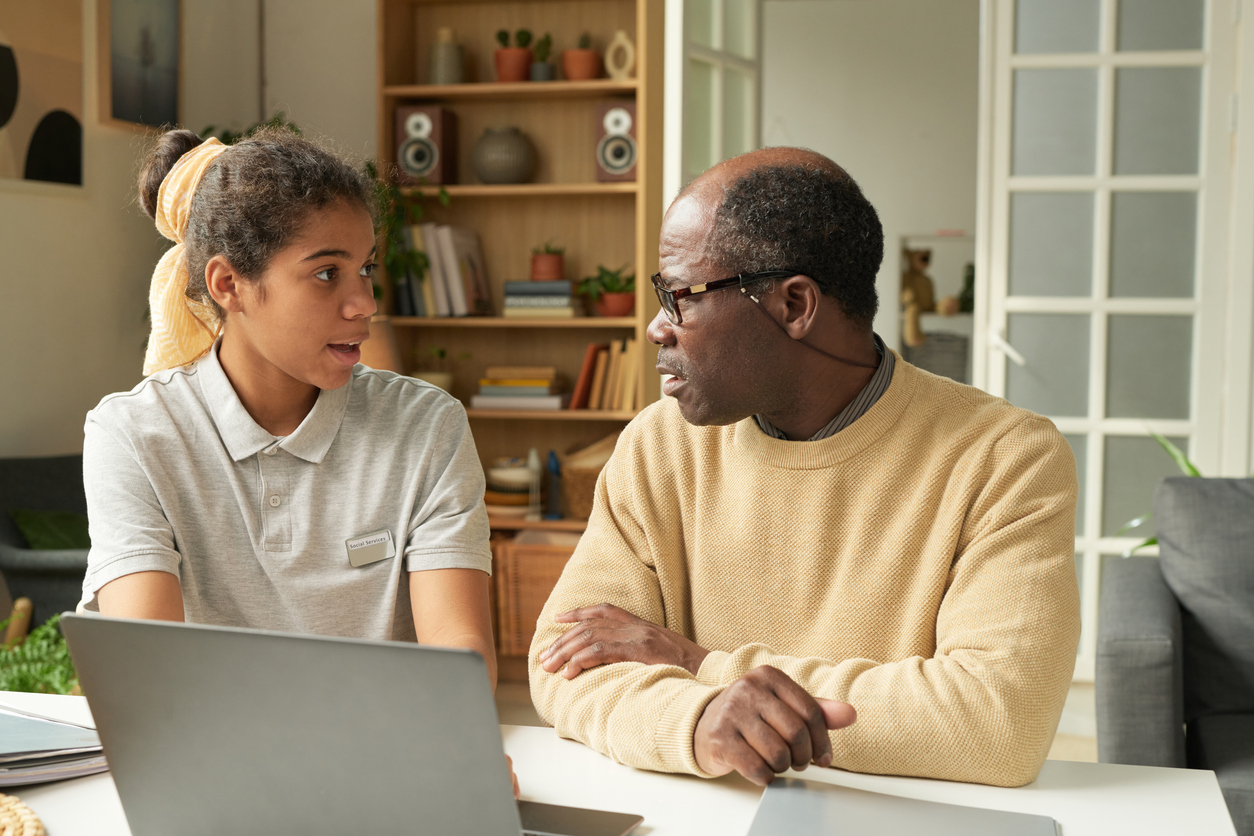 Engaging in Productive Discussion at Well-Lit Office Desk, Help Your Child Launch with Confidence:  Shift from CEO to Coach_CUWFA Member Exclusive